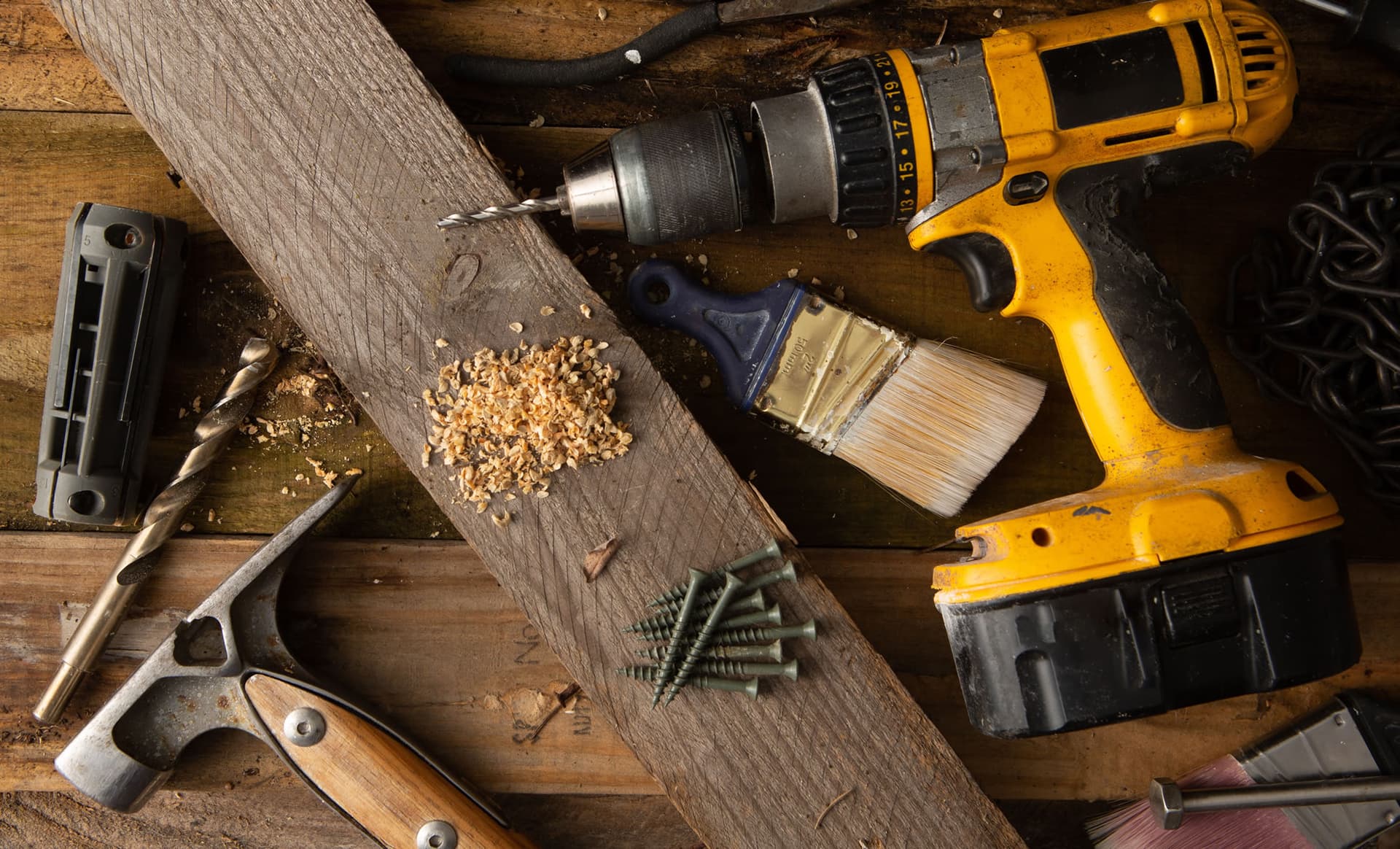 Cordless drill and tools for a drywall patching job