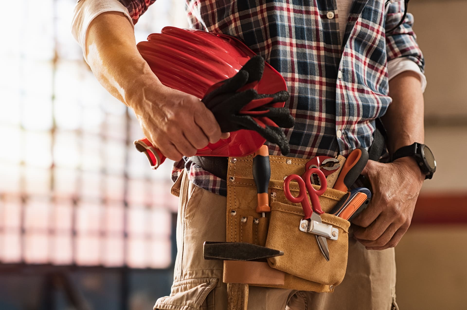 Bleuwave handyman with tool belt ready for work
