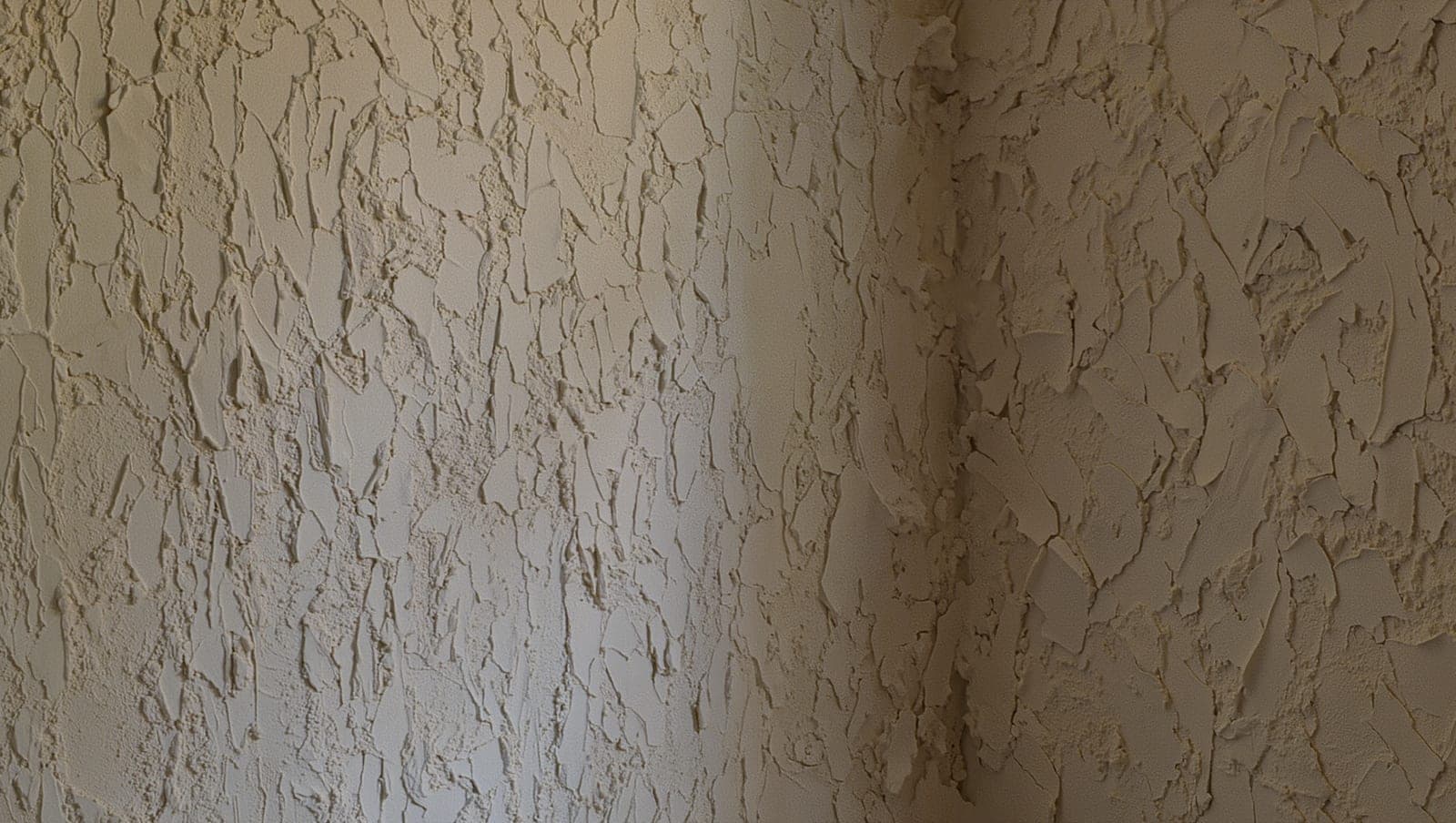 Knockdown wall texture with a repaired section blended in